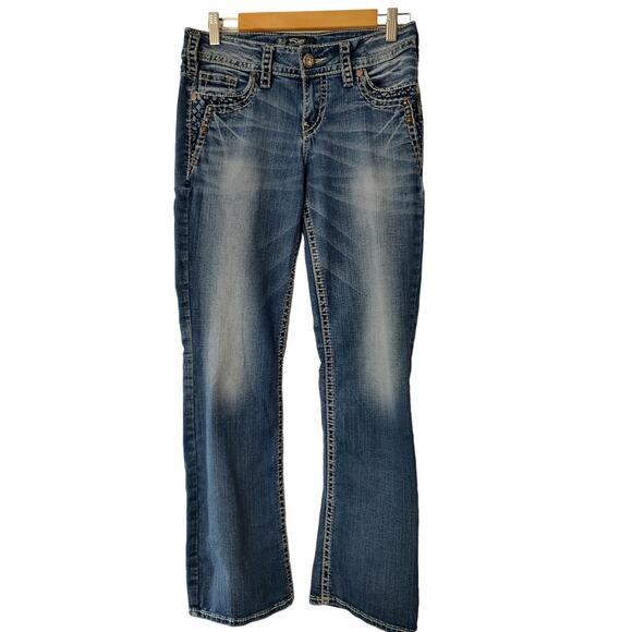 Silver Jeans Denim - Silver Blue Med Wash Suki Mid Rise Slim Fit Boot Cut Embroidered Jeans 27/31